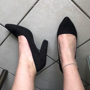 Black suede pumps
